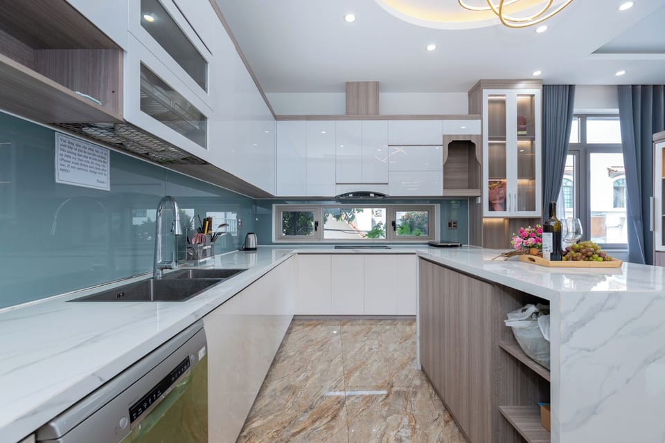 Deluxe Villa, Multiple Bedrooms, City View, Beachfront | Private kitchen | Fridge, microwave, stovetop, dishwasher