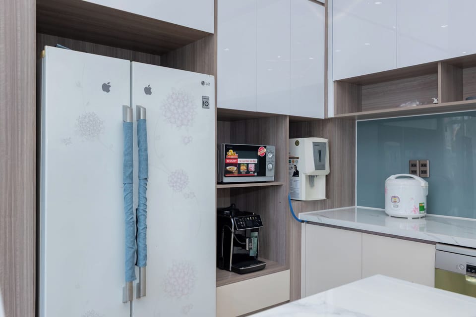 Deluxe Villa, Multiple Bedrooms, City View, Beachfront | Private kitchen | Fridge, microwave, stovetop, dishwasher