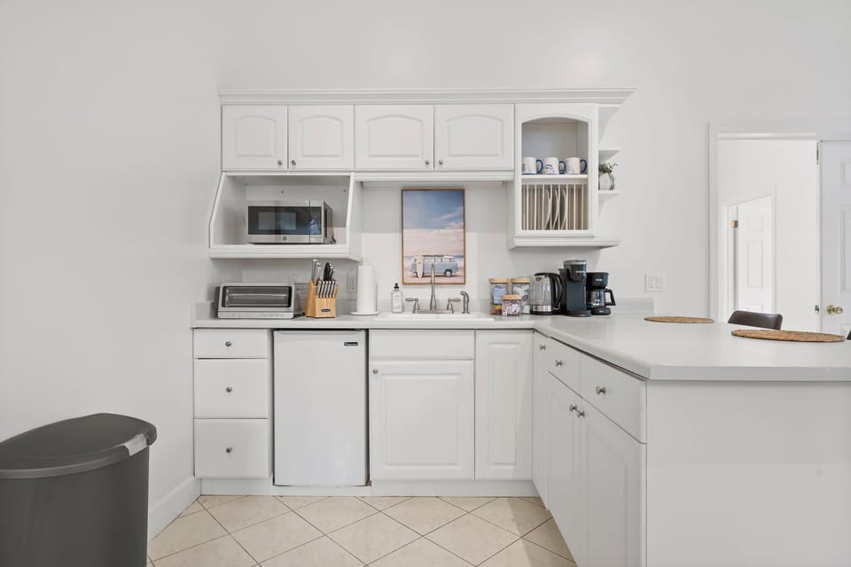 Fully equipped kitchen with modern appliances and sleek design