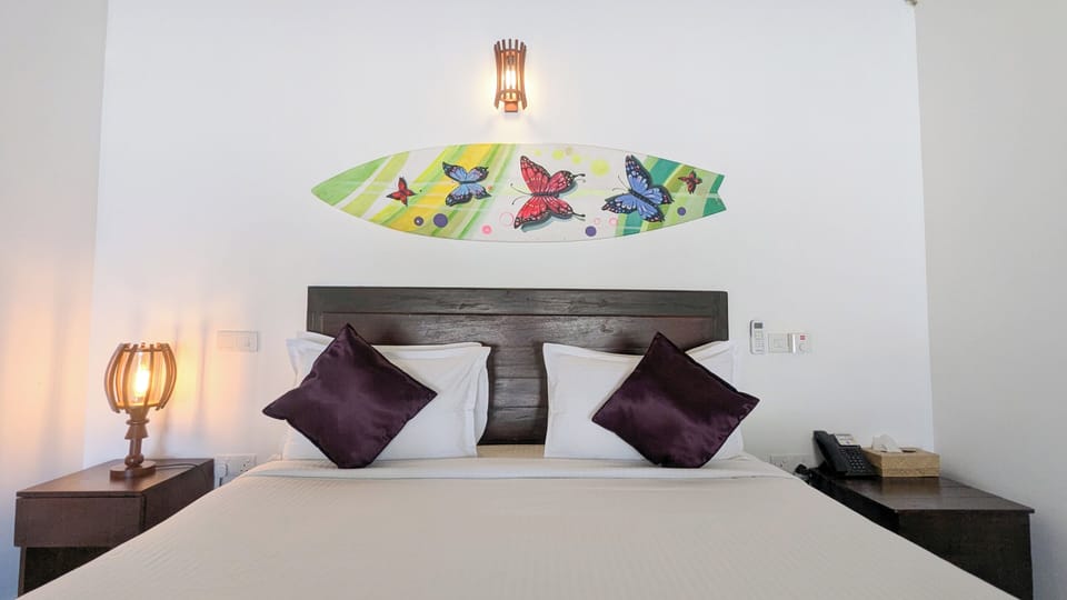 Deluxe Double Room | Select Comfort beds, minibar, desk, blackout drapes