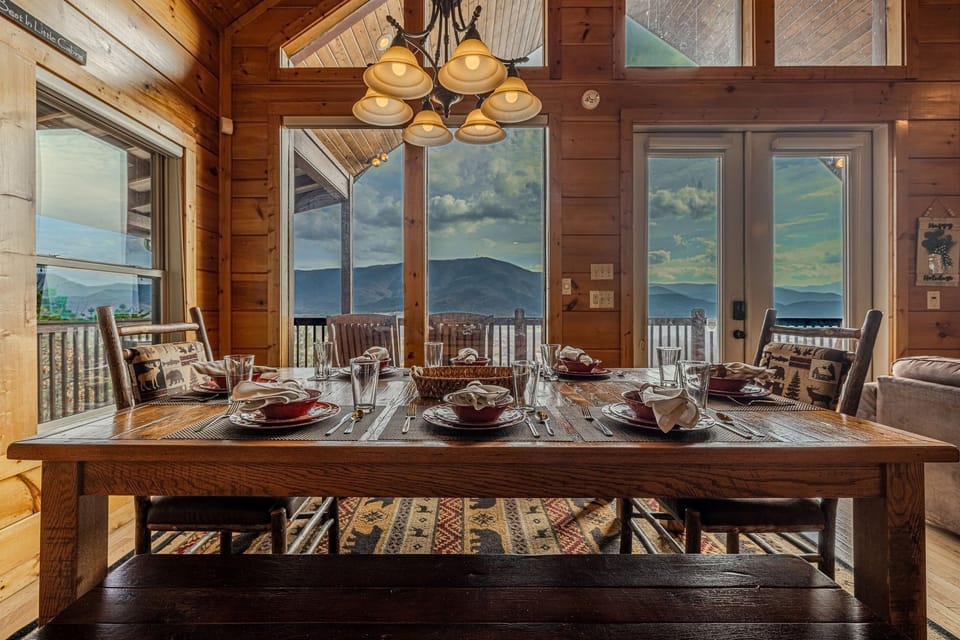 A meal is better when shared with a view like this. The thoughtful setting ensures a special, intimate dining experience for all guests.