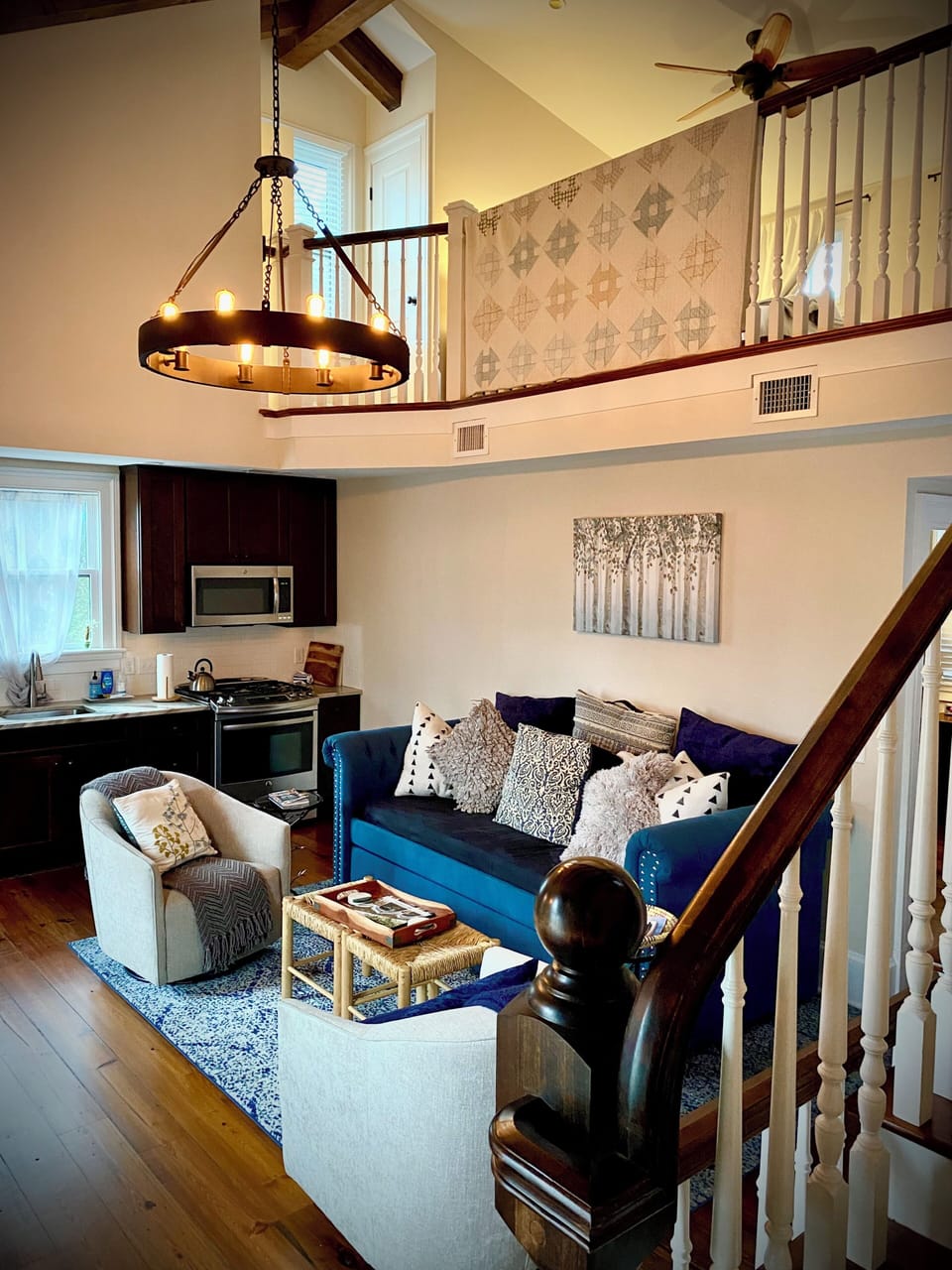 Open, beautiful details in this historic carriage house. So cozy!