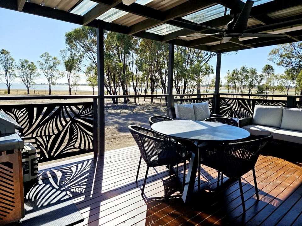 Wow factor large deck with comfortable outdoor furniture and views of Lake Waranga within walking distance.