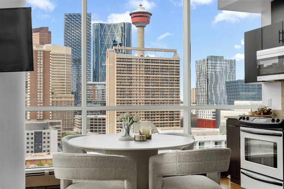 This elegant downtown Calgary apartment combines modern comfort with unbeatable location. Soak in the cityscape from oversized windows, enjoy a morning coffee bathed in sunlight, and explore world-class dining just steps from your door.