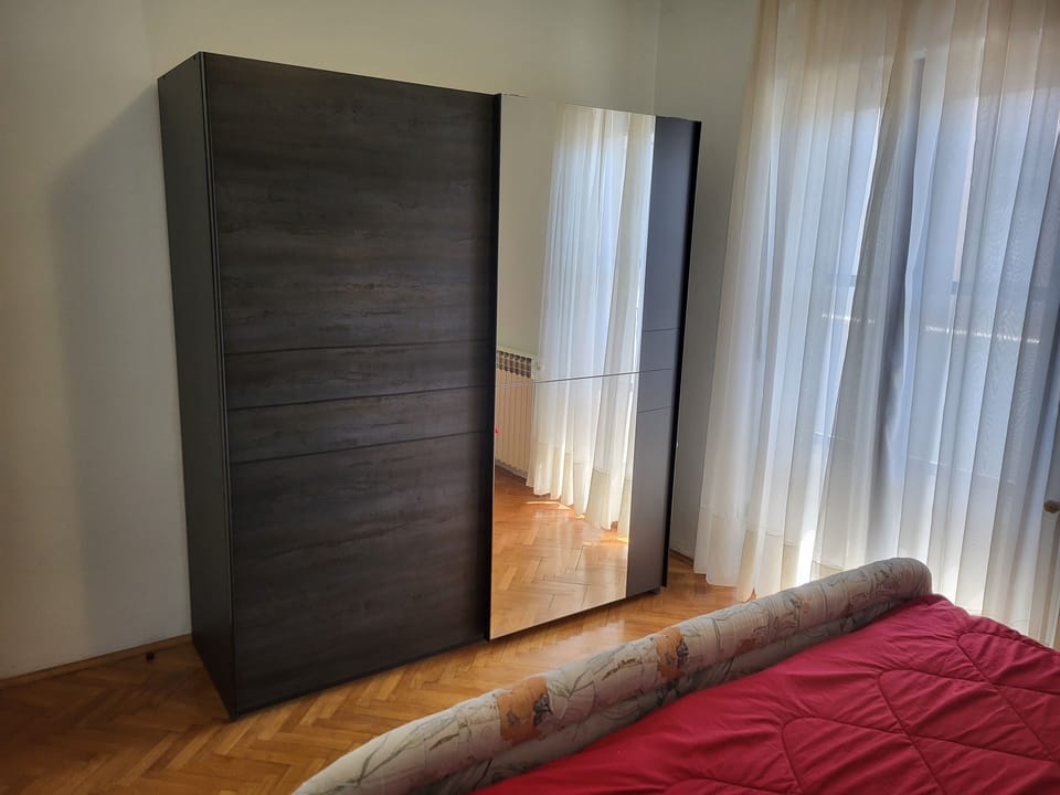 Third bedroom with a wardrobe closet