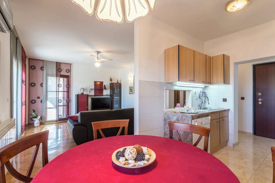 Dining area overlooking the kitchen and living area