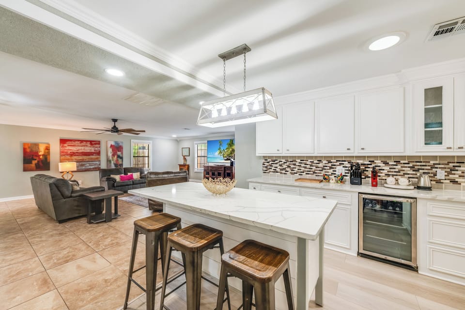 Bright open kitchen with full amenities—ideal for long stays and family cooking.