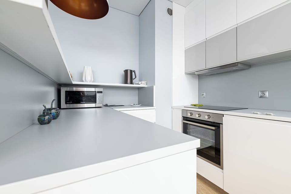 Apartment, Balcony, City View | Private kitchenette | Electric kettle