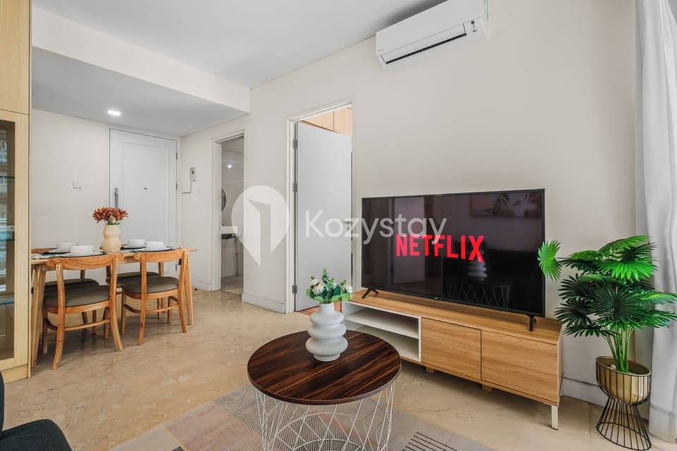 Apartment, 2 Bedrooms, City View | Living area | 43-inch Smart TV with cable channels, Netflix, streaming services