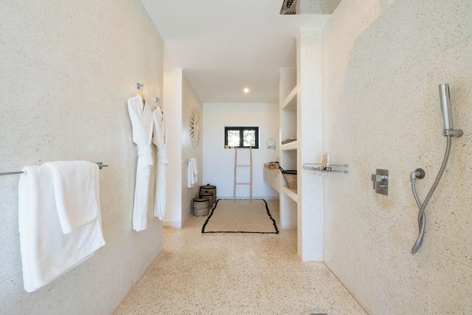 Luxury Suite, 1 King Bed, Terrace, Pool View | Bathroom | Free toiletries, hair dryer, bathrobes, slippers