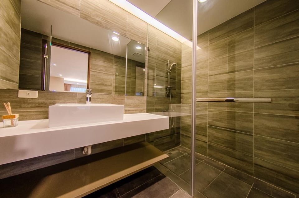 Shower, free toiletries, hair dryer, slippers