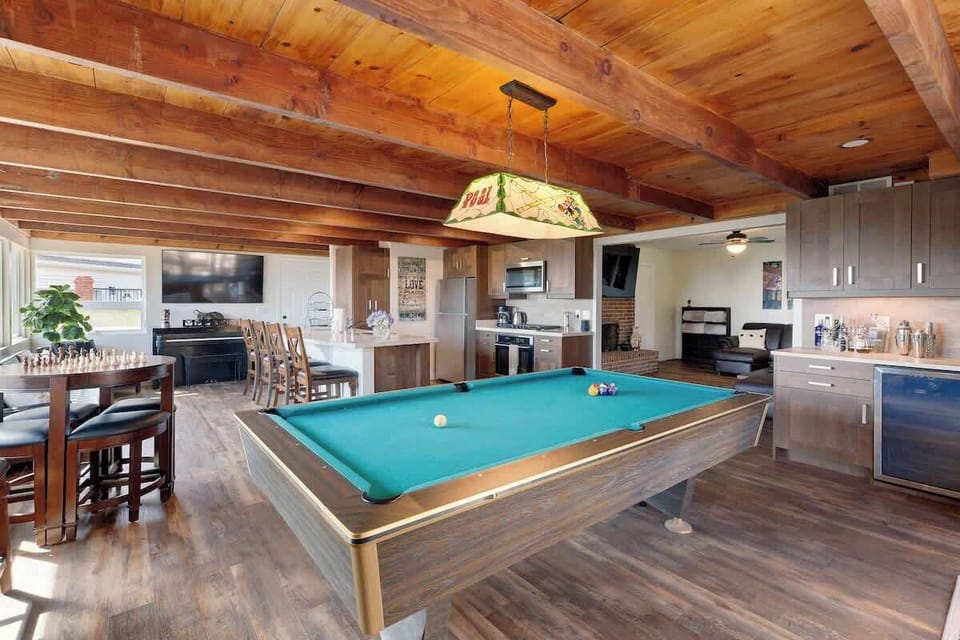 Downstairs game room and kitchen area.