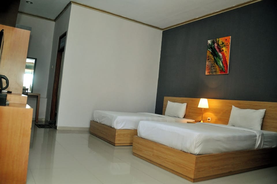 Deluxe Twin Room, Garden View | Living area