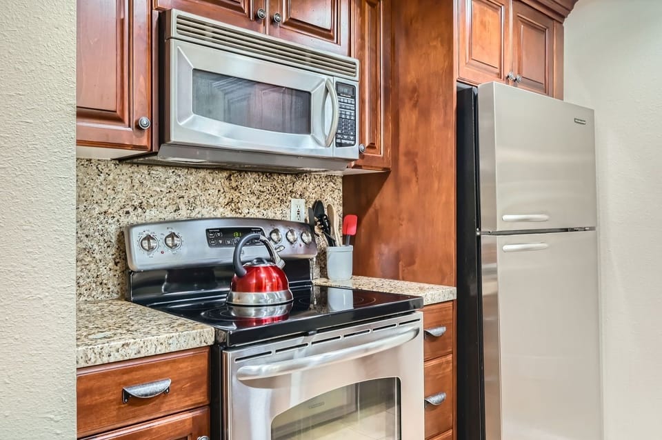 Condo, 2 Bedrooms | Private kitchen | Coffee/tea maker, fridge, oven, electric kettle