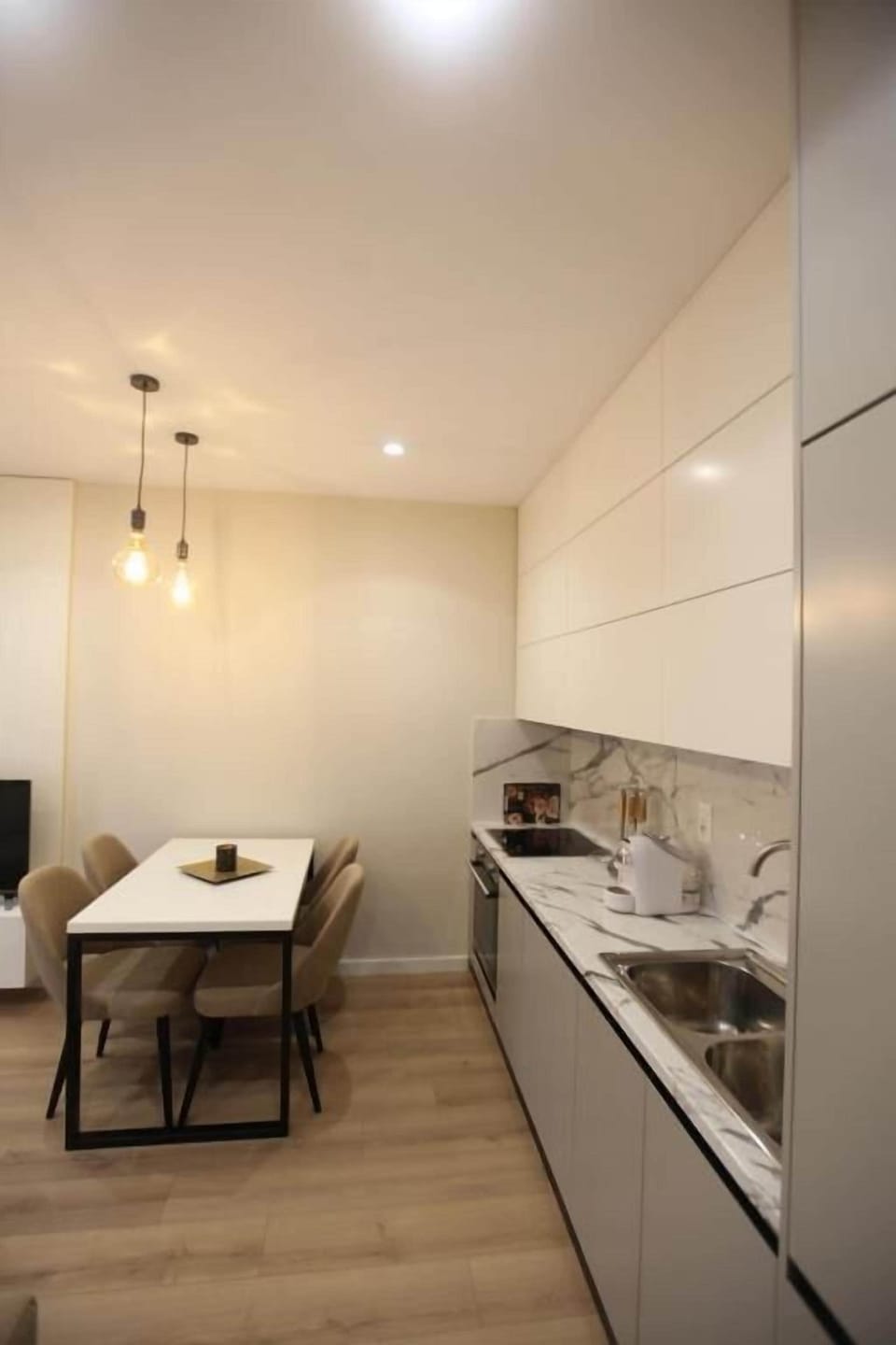 Apartment | Living area | 50-inch flat-screen TV with satellite channels