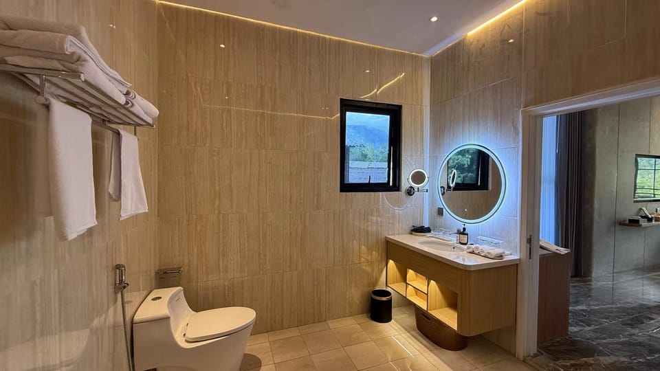 Shower, free toiletries, hair dryer, slippers