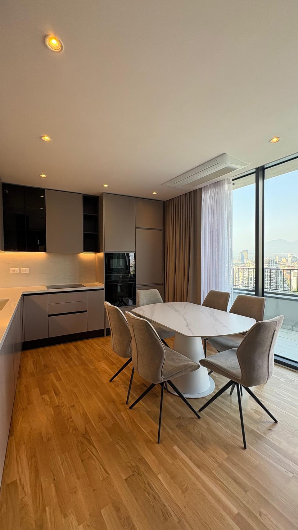 Three-Bedroom Deluxe Apartment | Private kitchen | Oven, stovetop