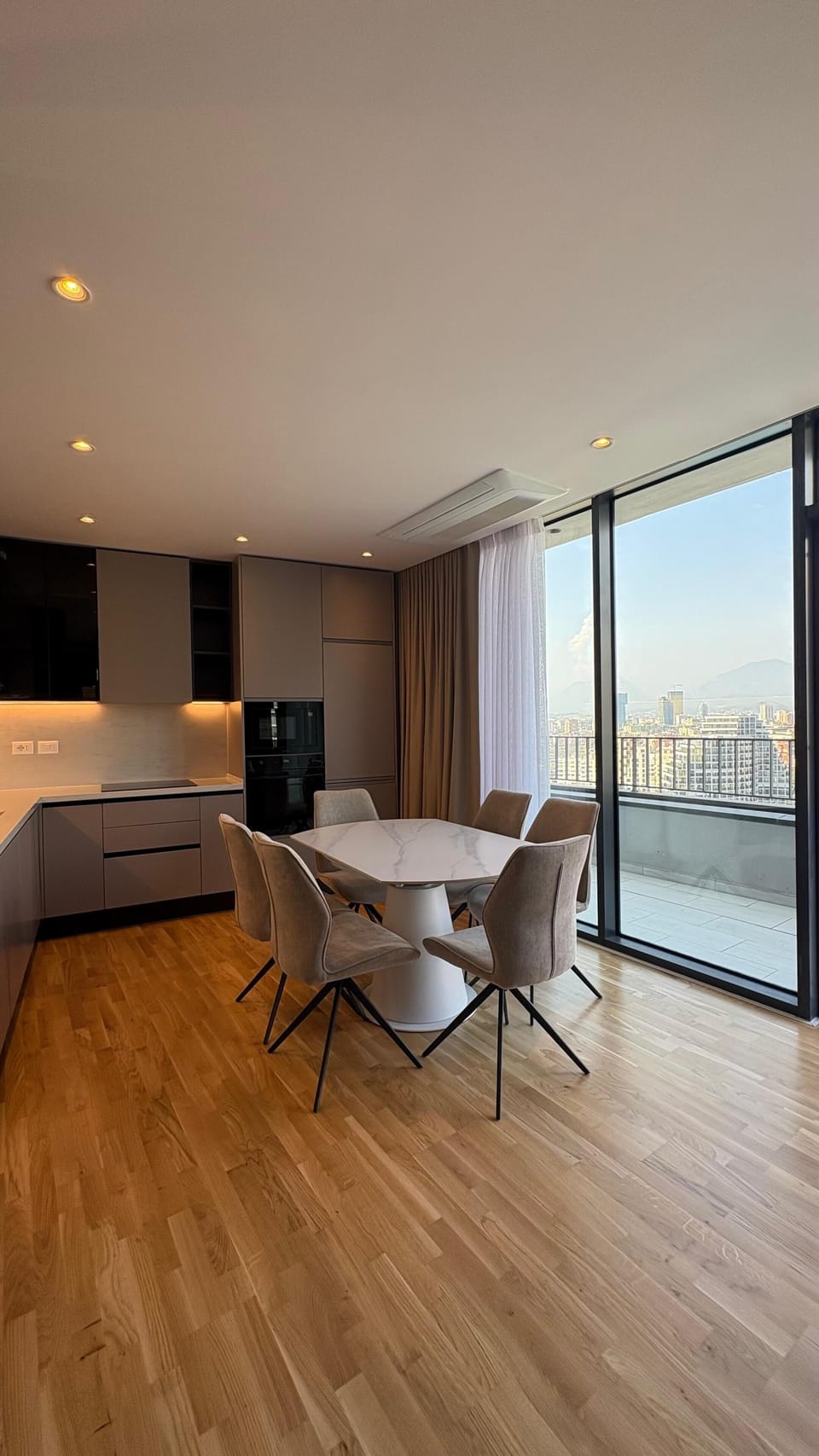 Three-Bedroom Deluxe Apartment | Private kitchen | Oven, stovetop