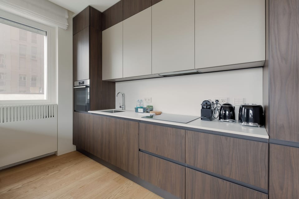 Appartamento con 2 camere da Letto, Via Santa Sofia 8 | Private kitchen | Espresso maker, electric kettle