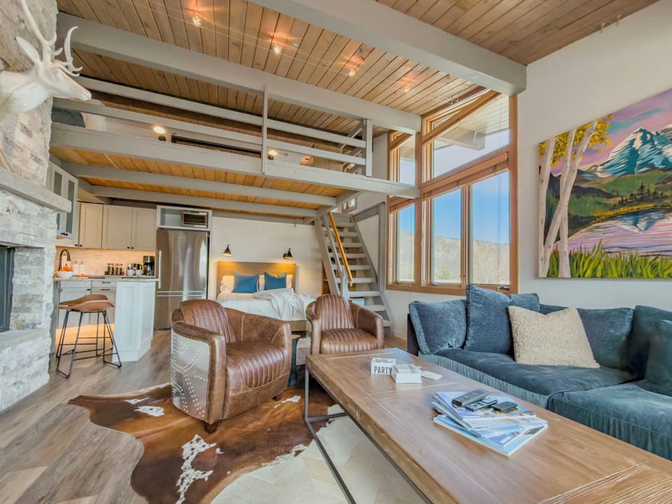 Soaring ceilings and views of the nearby peaks create the perfect backdrop for unstructured downtime.