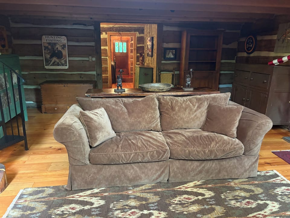 Living area with sleeper sofa master bedroom full bath