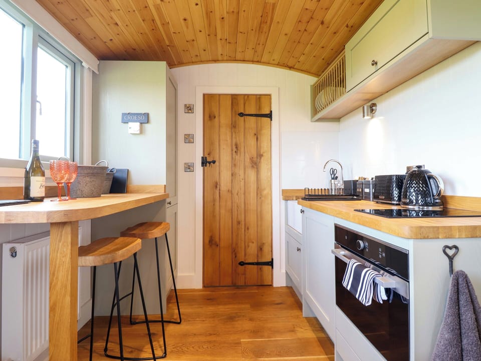 Fridge, toaster, cookware/dishes/utensils