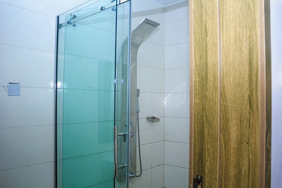 Shower, slippers, bidet, towels