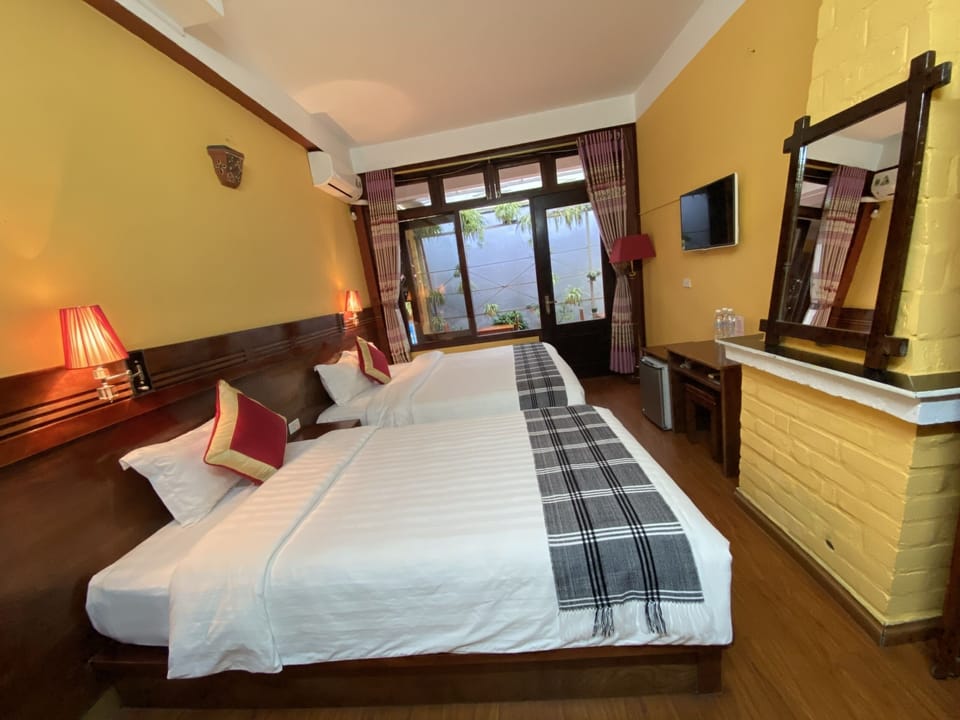 Family Room | Free minibar, desk, rollaway beds, free WiFi