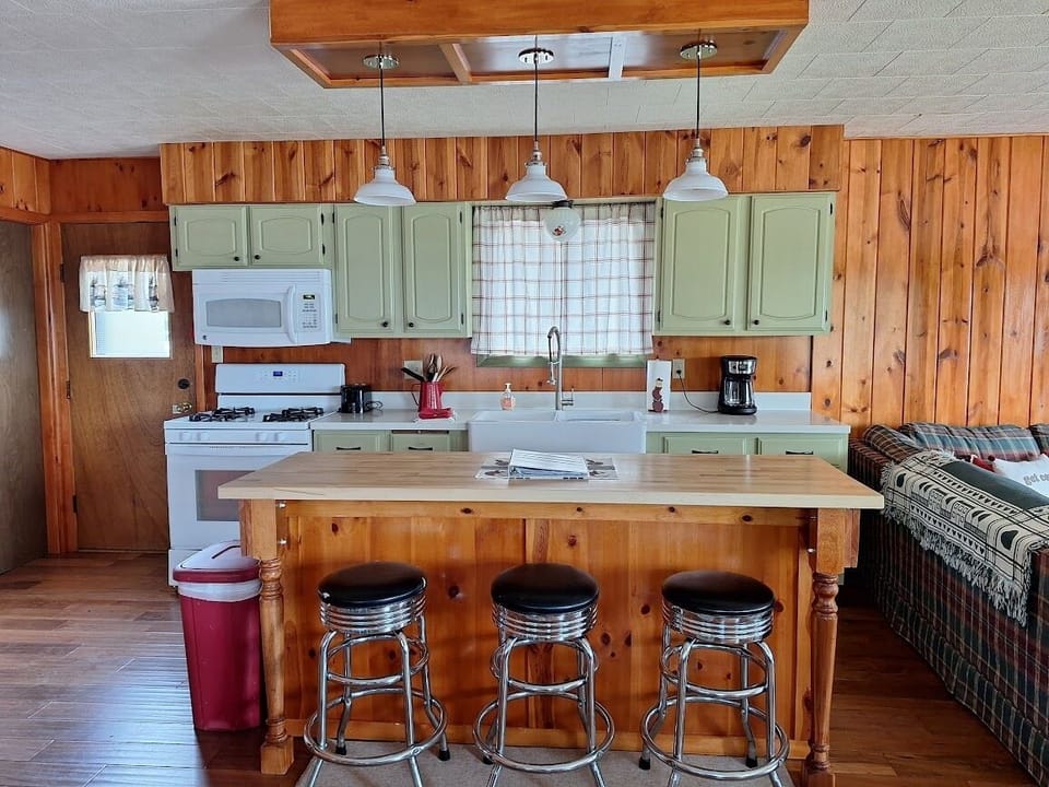 Large island for food prep, serving, or dining.