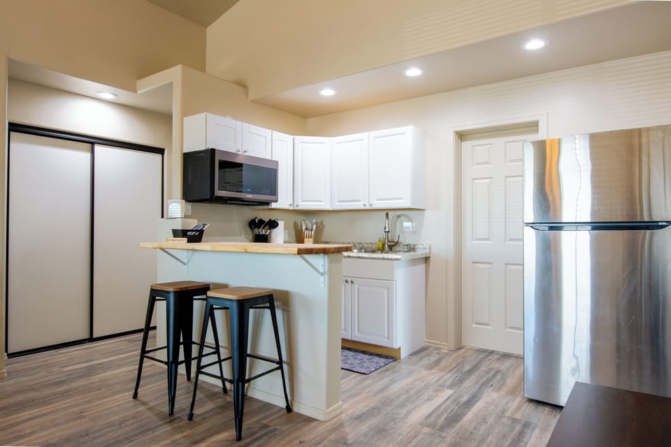 Kitchen with bar stools