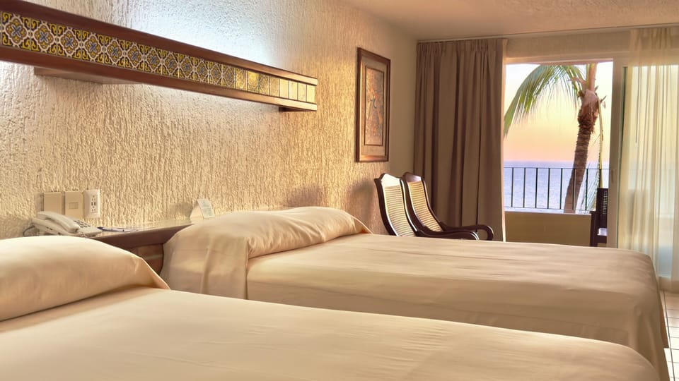 Habitación estándar vista al mar todo incluido | Premium bedding, in-room safe, iron/ironing board, free WiFi