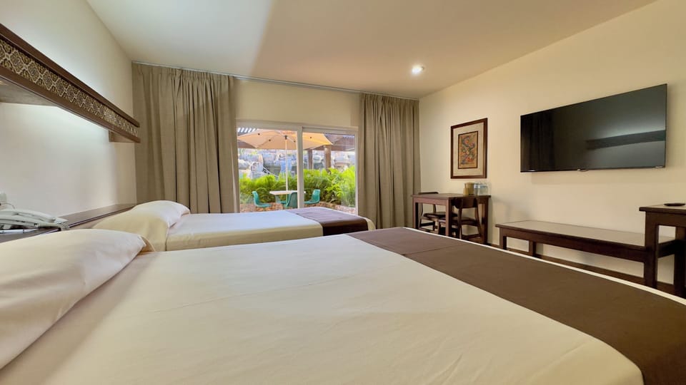 Habitación estándar vista al jardín todo incluido | Premium bedding, in-room safe, iron/ironing board, free WiFi