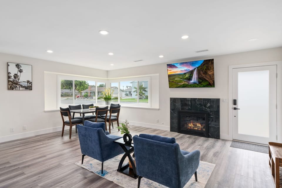 Natural light, modern finishes, and a fireplace create the ideal place to relax.