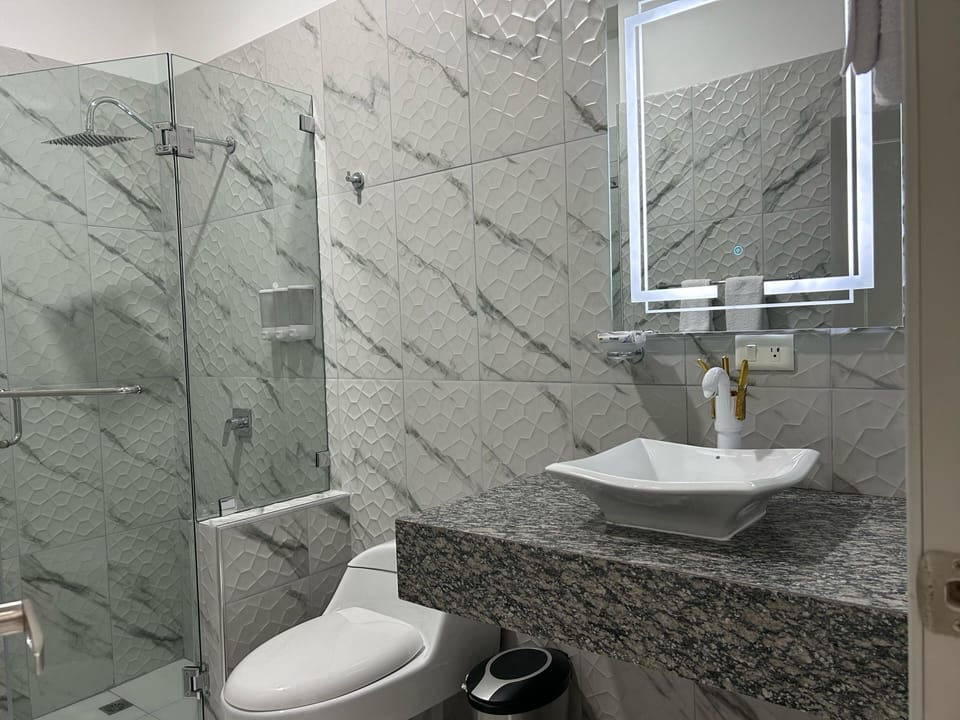 Shower, towels, soap, shampoo