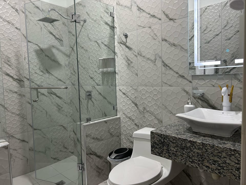 Shower, towels, soap, shampoo