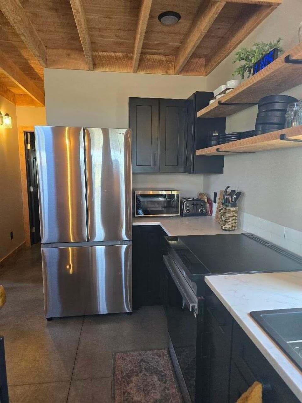 New appliances and a well appointed kitchen make preparing meals a pleasure.