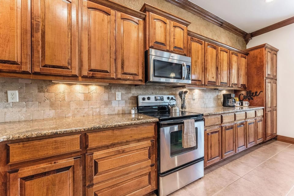 Modern stainless steel appliances; lots of storage space for your groceries.