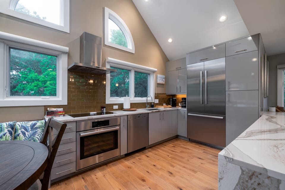 Beautiful stainless steel appliances in the open kitchen.