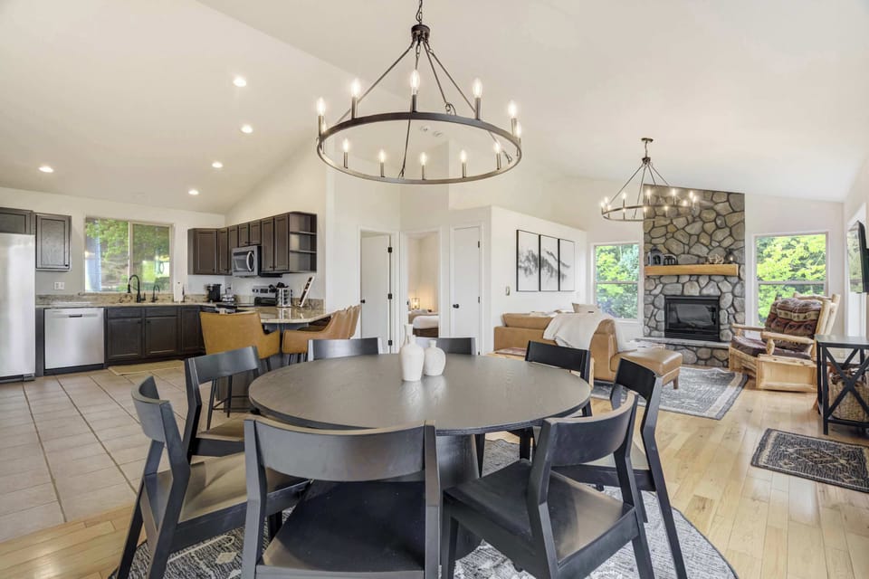 Enjoy the ease of open-concept living with a fully equipped kitchen, spacious dining area, and cozy living room all connected for effortless group gatherings.

