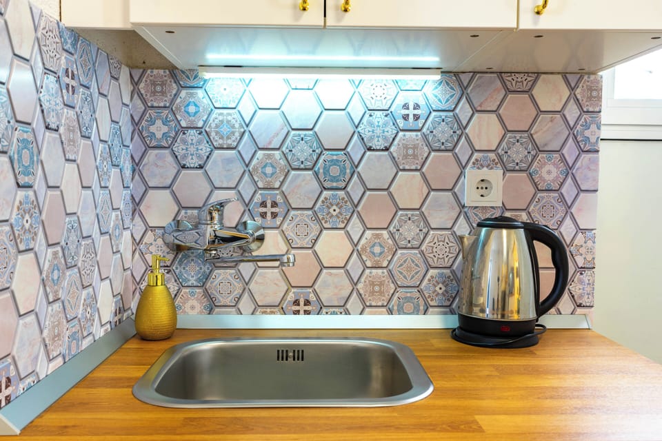 Comfort Apartment | Private kitchen | Coffee/tea maker, electric kettle, eco-friendly cleaning products