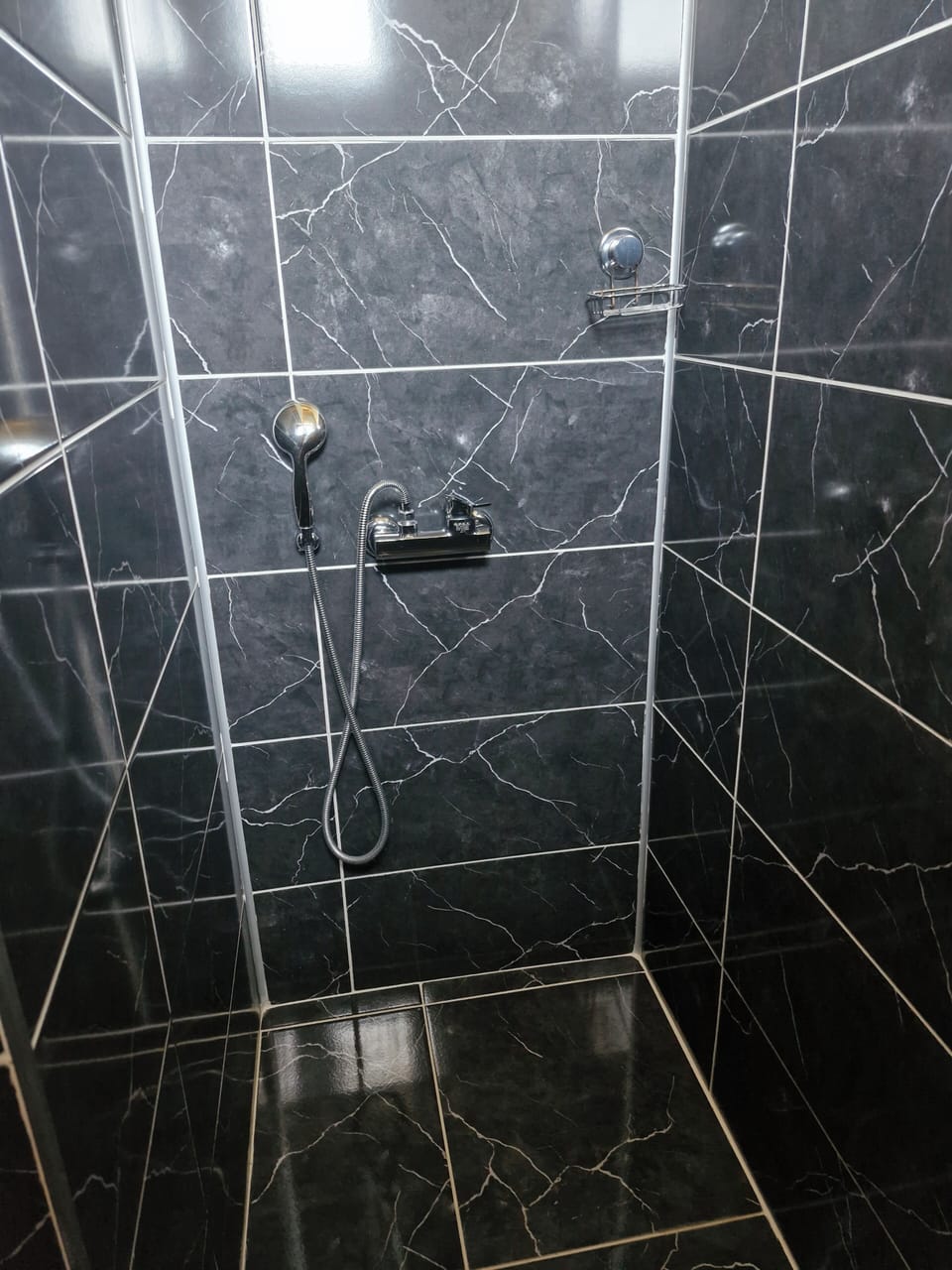 Double Room, Garden View | Bathroom | Shower, hair dryer, slippers, towels