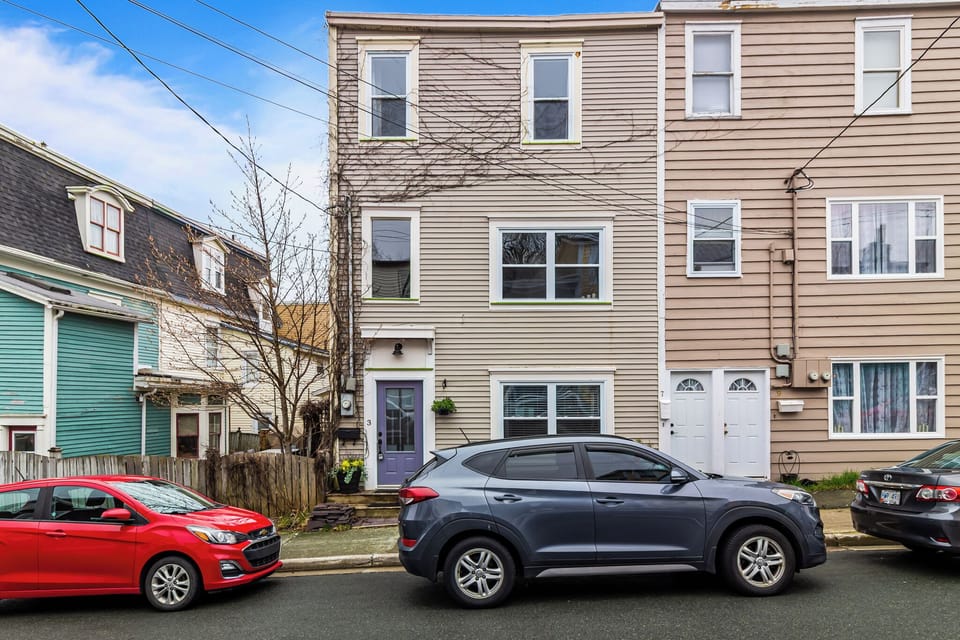 Welcome to your stylish retreat! This charming three-story townhouse sits in a lively neighborhood, offering easy access to local gems. A picture-perfect stay starts here!