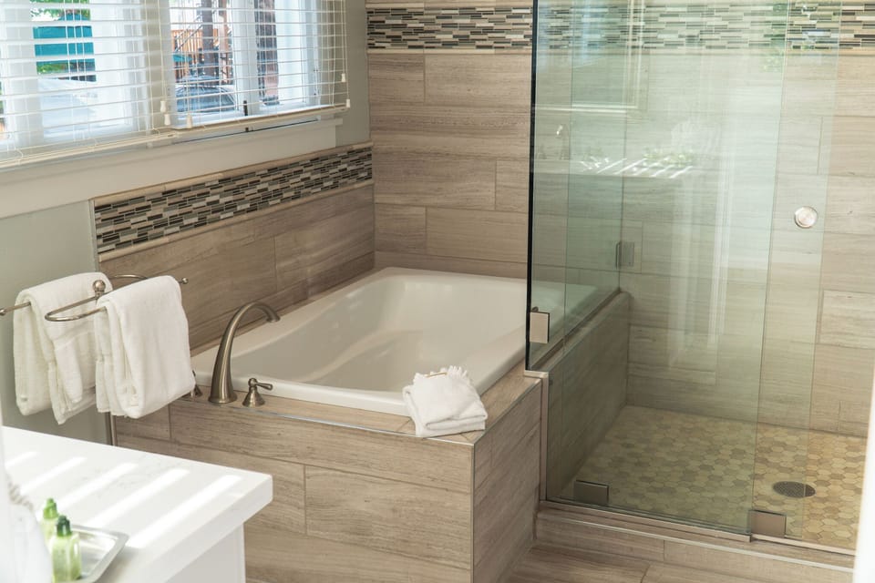 Grand Teton Suite | Bathroom | Shower, hair dryer, bathrobes, slippers