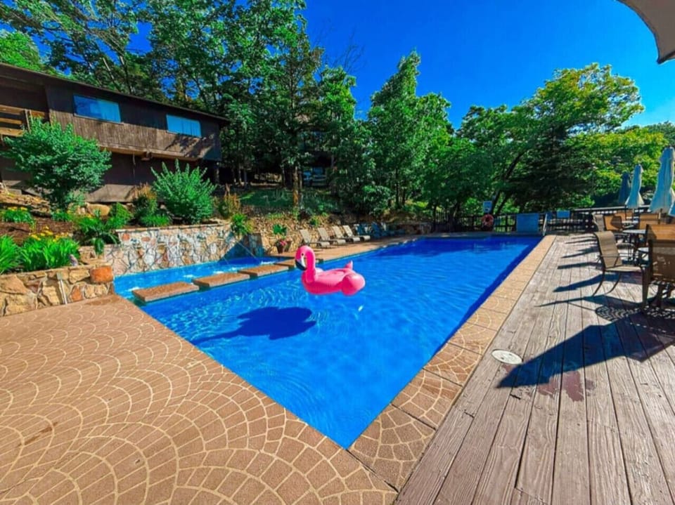 Soak up the sun and lake views! Guests at Treetop Villas enjoy access to two beautiful lakefront pools.  The perfect spot to relax, swim, and float the day away.