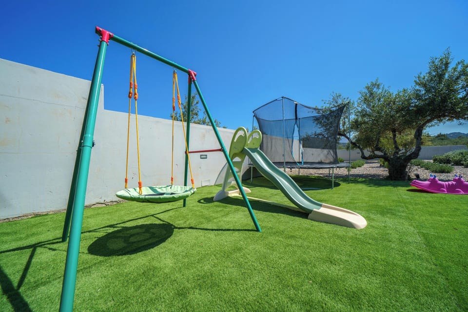 The private grounds offer generous space for games, play, and discovery.