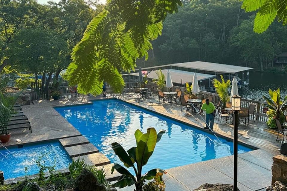 Wake up to a breathtaking morning at Treetop Village. Nestled along the serene Lake of the Ozarks. Where the golden sunrise filters through the dense canopy of trees. This gem is the perfect escape into the heart of Missouri’s scenic landscape