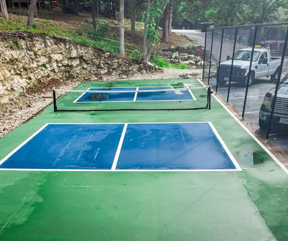 Pickleball court located across from the pool – paddles available to check out at the Treetop office during business hours
