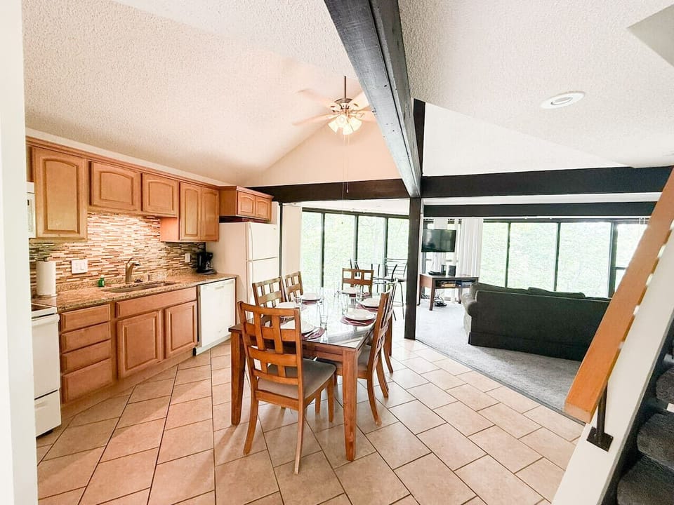 Enjoy a fully functional kitchen with an open layout seamlessly connecting to the dining room, making conversations with your group effortless.