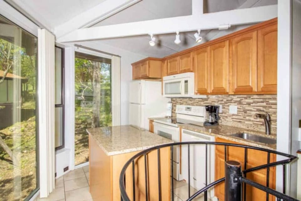 Cooking with a view (or just preparing snacks!). Our kitchen is designed for easy and enjoyable meal prep.