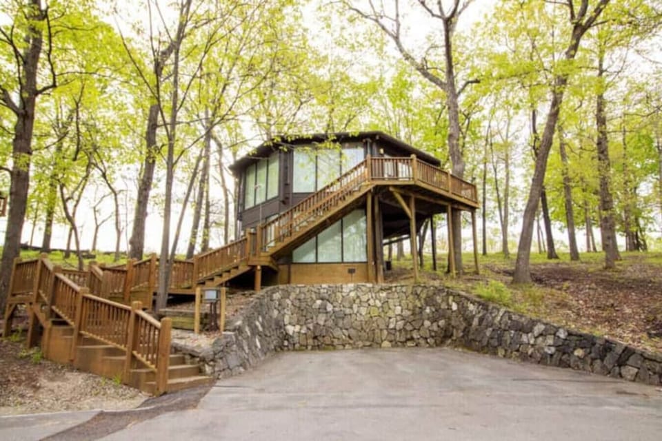 Experience the magic of Treetop Village. This is your charming villa, The Treetop Nest, inviting you to a serene escape above it all.